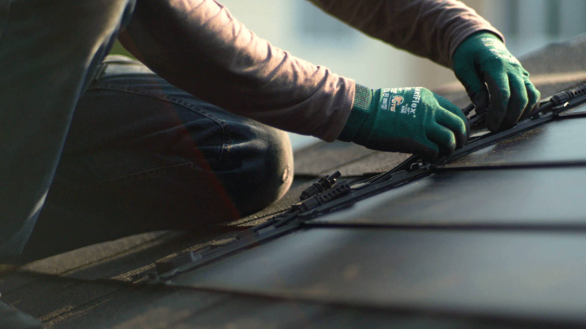 Contractor Installing Solar Shingles